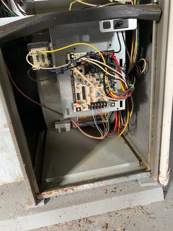 Completed comprehensive tune-up service on residential outdoor AC unit per Home Depot work order #F62125329. Performed full system inspection including control board examination, electrical connections verification, and component testing. All wiring connections at circuit board terminals were inspected and found secure, contactor and relay operation confirmed normal, and interior cabinet components showed typical wear consistent with system age. Exterior panels and copper refrigerant lines inspected with no visible damage or leaks detected.