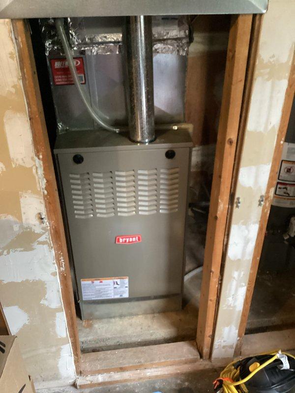Completed comprehensive tune-up service on a Bryant furnace unit located in the garage. Performed standard maintenance inspection including evaluation of the evaporator coil assembly, verification of electrical connections and wiring integrity, and assessment of overall system operation. Unit found to be in satisfactory working condition with all components functioning properly at time of service.