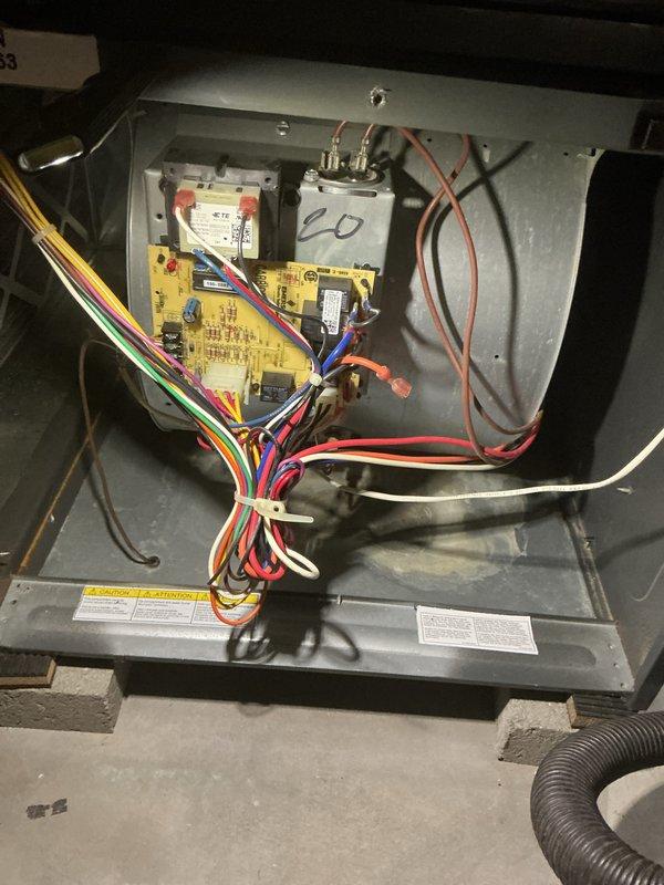Completed preventive maintenance tune-up on Goodman central air conditioning system, model CAPF4860C6DB. Inspected and verified proper operation of electrical components including control board, contactor, capacitor, and all associated wiring connections within the air handler unit. Confirmed refrigerant type and system pressures are within manufacturer specifications, verified all safety labels and warnings are intact and legible.