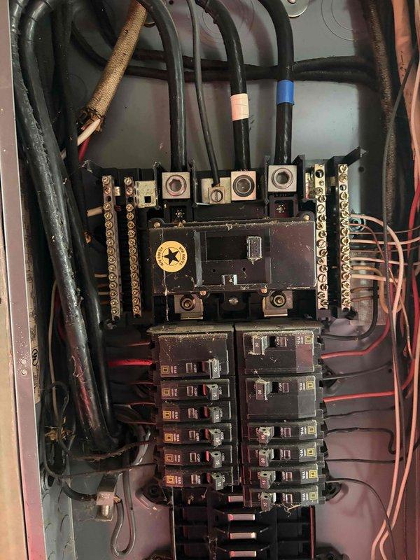 Responded to service call for two non-functioning kitchen outlets following storm event. Performed comprehensive electrical system inspection including main service panel, circuit breakers, and exterior meter enclosure. Inspected all circuit breaker connections, verified proper panel wiring integrity, and checked for signs of surge damage or compromised conductors. Examined exterior electrical service equipment including weatherhead, meter base, and associated conduit for storm-related damage. Documented existing panel conditions showing age-appropriate wear on some conductors. Restored power to affected kitchen outlet circuits and verified proper operation of all receptacles. Confirmed electrical system returned to safe, functional condition with no additional areas of concern identified.