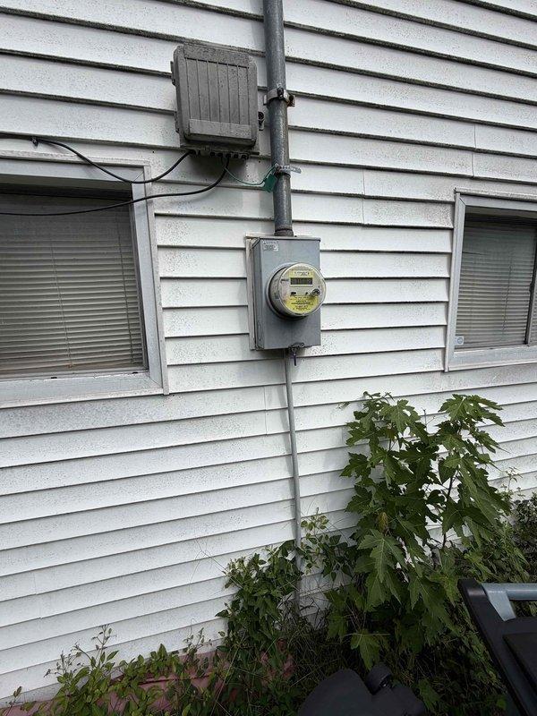 Responded to service call for two non-functioning kitchen outlets following storm event. Performed comprehensive electrical system inspection including main service panel, circuit breakers, and exterior meter enclosure. Inspected all circuit breaker connections, verified proper panel wiring integrity, and checked for signs of surge damage or compromised conductors. Examined exterior electrical service equipment including weatherhead, meter base, and associated conduit for storm-related damage. Documented existing panel conditions showing age-appropriate wear on some conductors. Restored power to affected kitchen outlet circuits and verified proper operation of all receptacles. Confirmed electrical system returned to safe, functional condition with no additional areas of concern identified.