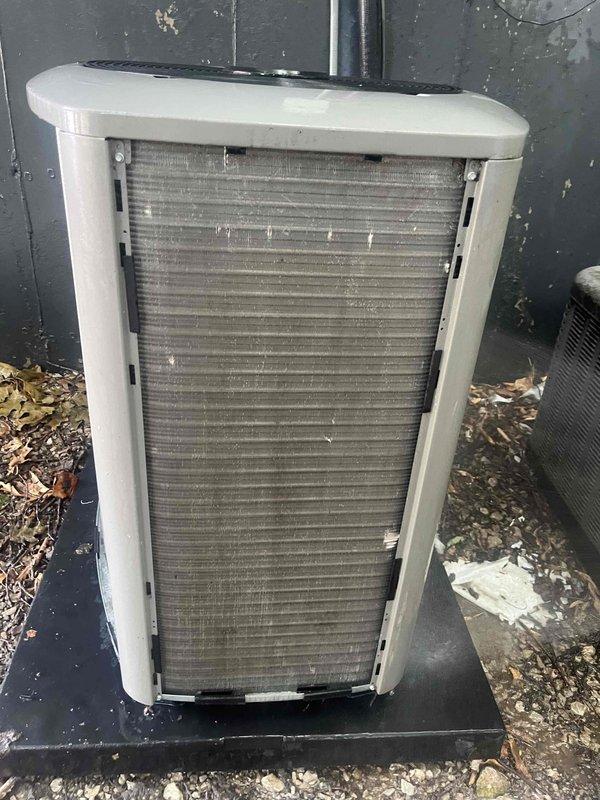 Responded to service call for non-operational air conditioning unit and reported condensation issue in mechanical closet. Performed system inspection of outdoor condenser unit, noting accumulated debris around base and dirty coil fins requiring cleaning. Inspected indoor air handler and replaced air filter, then investigated moisture source in utility closet to determine if condensation was related to furnace, water heater, or A/C system drainage.