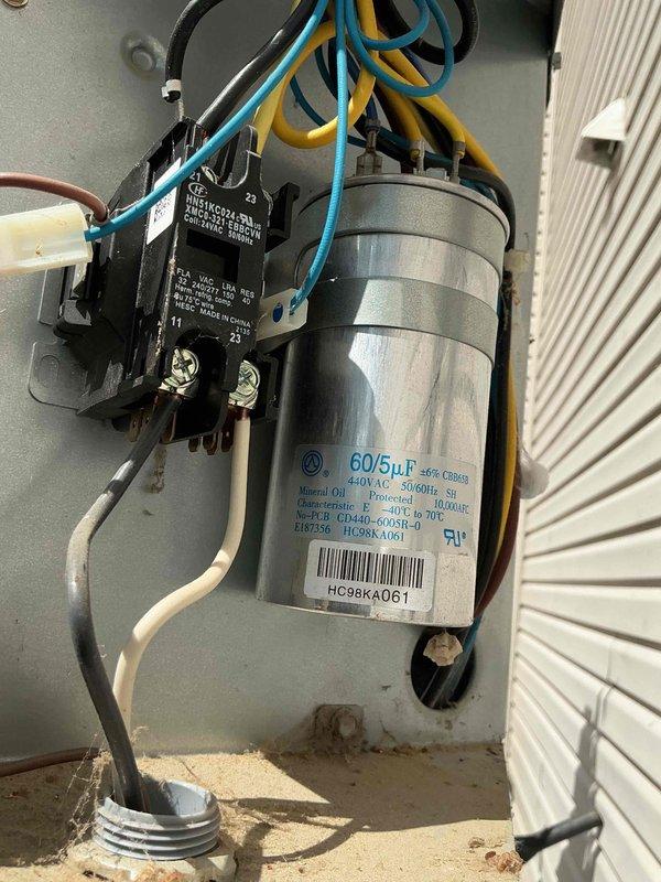 Completed comprehensive tune-up and maintenance service on residential air conditioning and heating systems. Performed standard preventive maintenance procedures including inspection of outdoor condensing unit electrical components, verified proper operation of dual-run capacitor (60/5μF rating), contactor assembly, and associated wiring connections. Inspected indoor air handler/furnace equipment in basement, conducted system performance evaluation, and confirmed both systems operating within normal parameters with no deficiencies noted.