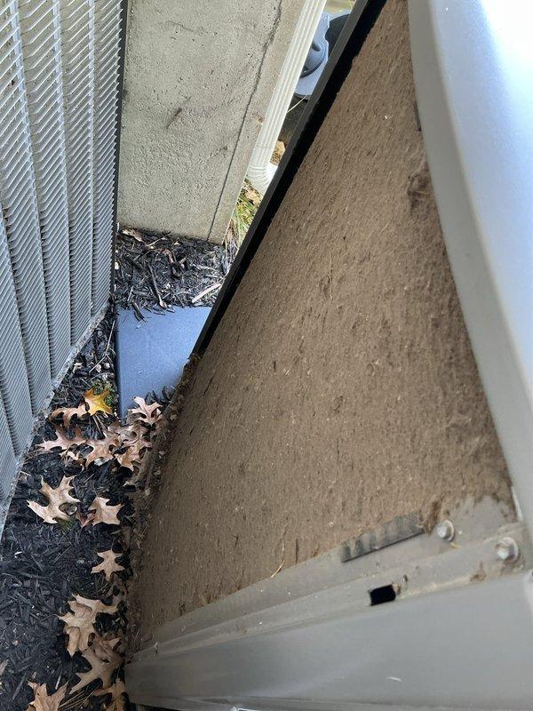 Responded to no cooling complaint on 8-year-old Lennox air conditioning system affecting entire home. Performed diagnostic evaluation of outdoor condensing unit located in narrow side yard access area between structures. Inspected Sensi digital thermostat for proper operation and temperature differential. System evaluated for refrigerant levels, electrical components, airflow restrictions, and mechanical functionality to identify root cause of inadequate cooling performance.