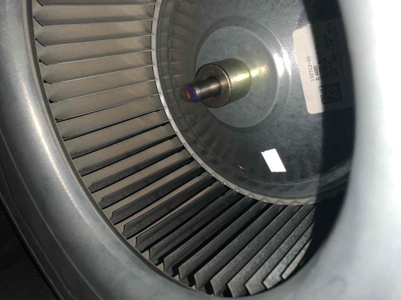 Completed comprehensive cooling season tune-up on 12-year-old Lennox air conditioning system with 13-year-old accessories. Performed full system inspection including blower wheel assembly cleaning and verification, checked all electrical connections, tested capacitors, measured refrigerant pressures, inspected condenser coil and fan operation, verified proper airflow through both intake louvers and discharge grille, and confirmed unit is operating within manufacturer specifications. System currently functioning normally with no immediate repairs required.