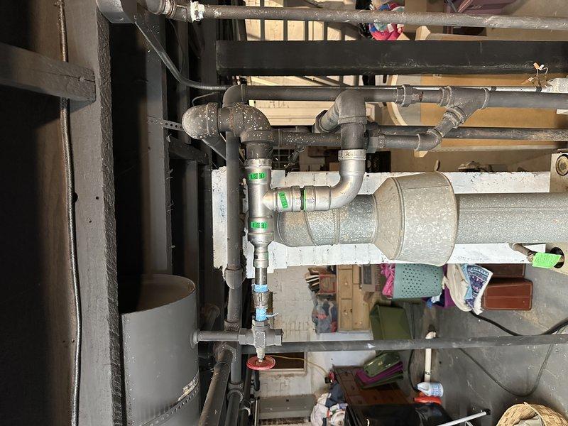 Completed system drain and bleed procedure on HVAC hydronic piping assembly. Utilized ProPress fittings to install replacement components on aged copper piping system with oxidized connections. Addressed air pockets and circulation issues in the heating distribution lines to restore proper system operation and heat transfer efficiency.