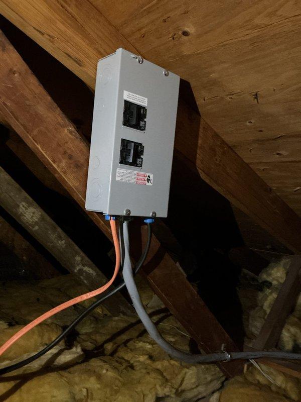Installed new electrical subpanel in attic space to support third-floor heating system expansion. Ran conduit and wiring from main service panel through crawl space, mounted subpanel to ceiling joists, installed circuit breakers, and completed all connections per code requirements.