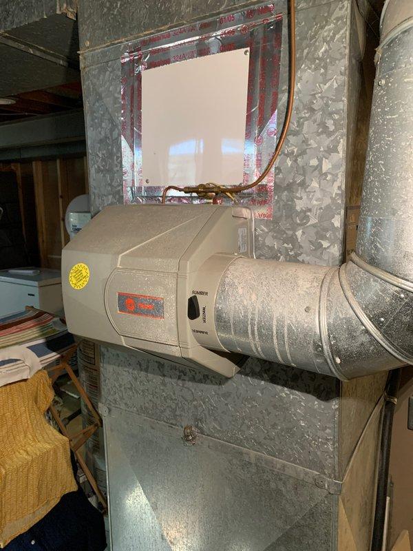 Completed preventive maintenance tune-up on 10-year-old furnace system located in basement. Performed comprehensive inspection of heating unit, ductwork, and integrated humidifier system. Verified proper operation of all components, checked air filter condition, and confirmed system functionality for continued safe operation during heating season.