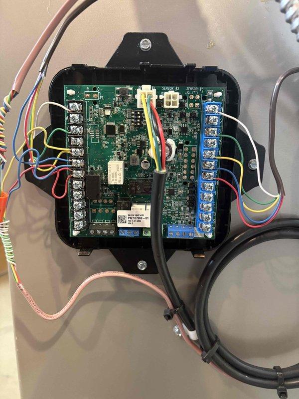 Responded to callback for ongoing humidity issues following recent new system installation. Inspected Lennox equipment control board and wiring connections, examining humidifier control terminals and associated sensor wiring. Verified proper connections at control board terminal blocks and checked humidifier communication wiring between system components to address persistent humidity control concerns reported after previous service visit.