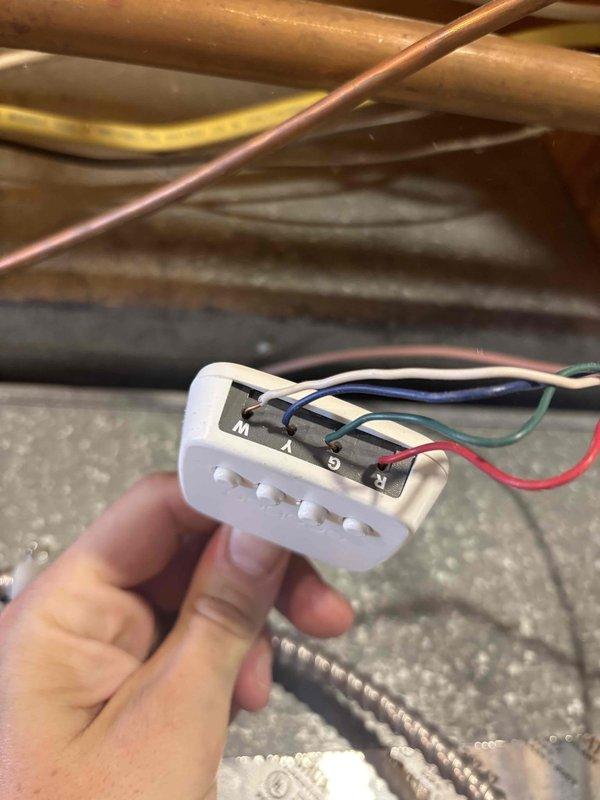 Responded to callback for ongoing humidity issues following recent new system installation. Inspected Lennox equipment control board and wiring connections, examining humidifier control terminals and associated sensor wiring. Verified proper connections at control board terminal blocks and checked humidifier communication wiring between system components to address persistent humidity control concerns reported after previous service visit.