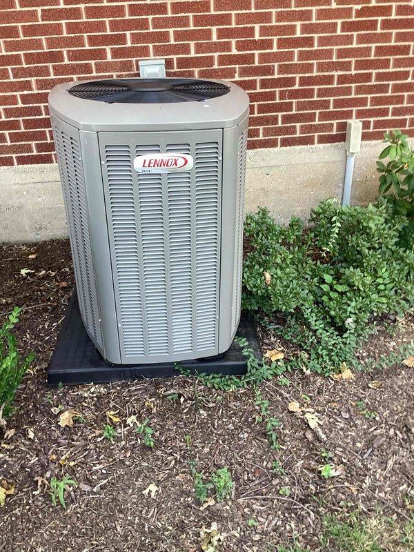 Responded to no cooling complaint on 4-year-old Lennox residential air conditioning system. Upon arrival, found evaporator coil completely frozen with ice buildup preventing airflow and refrigerant circulation. Shut down system to allow ice to thaw completely. Inspected air handler and discovered restricted airflow due to dirty air filter. Replaced filter and verified all supply registers were open and unobstructed. Checked blower motor operation and confirmed proper CFM after thaw cycle completed. Inspected outdoor condenser unit for proper operation, verified fan motor function, and cleaned debris from coil fins. Tested refrigerant pressures and found levels within manufacturer specifications. Cycled system through complete cooling cycle and monitored for proper operation. Verified 18-degree temperature split across evaporator coil and confirmed adequate airflow throughout home. System restored to normal cooling operation with no further issues detected.