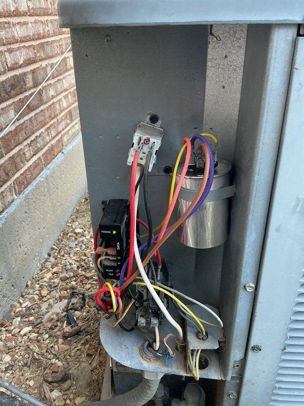 Responded to cooling complaint where system was unable to adequately cool the residence. Upon arrival, performed diagnostic evaluation of outdoor condensing unit. Opened electrical disconnect panel and inspected internal components including contactor, capacitor, and electrical connections. Tested capacitor function and verified proper voltage to unit. Examined refrigerant lines, electrical wiring, and overall system operation to identify root cause of cooling deficiency. Unit was successfully diagnosed and appropriate repairs completed to restore proper cooling performance.