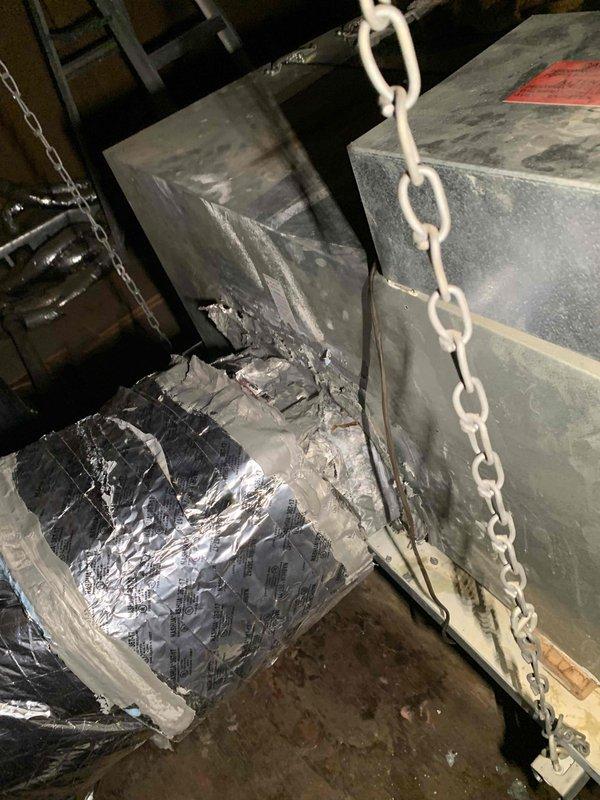 Responded to callback for frozen evaporator coil on HVAC system that was previously repaired. Upon arrival, confirmed unit had been shut off by customer to allow ice buildup to thaw. Inspected air handler unit in attic space, examined refrigerant lines, ductwork connections, and system components for underlying cause of freeze condition. Documented equipment condition with photos showing existing installation, copper line set, flexible ductwork, and cabinet assembly to verify proper thaw-out and assess system for airflow restrictions or refrigerant issues requiring further attention.
