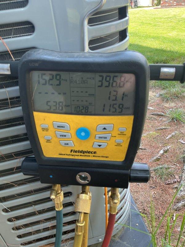 Responded to no cooling complaint on 10+ year old outdoor unit (Model MAMC306B1000NA). Customer reported system taking ten hours to reduce temperature by ten degrees following recent thermostat installation. Performed diagnostic evaluation using refrigerant manifold gauges to measure system pressures and temperatures on R410A split system. Unit specifications verified at 208/230V 1Ph 60Hz operation with design pressures of 550 PSIG high side and 250 PSIG low side. Comprehensive system performance assessment completed to identify cooling deficiency and determine necessary repairs.