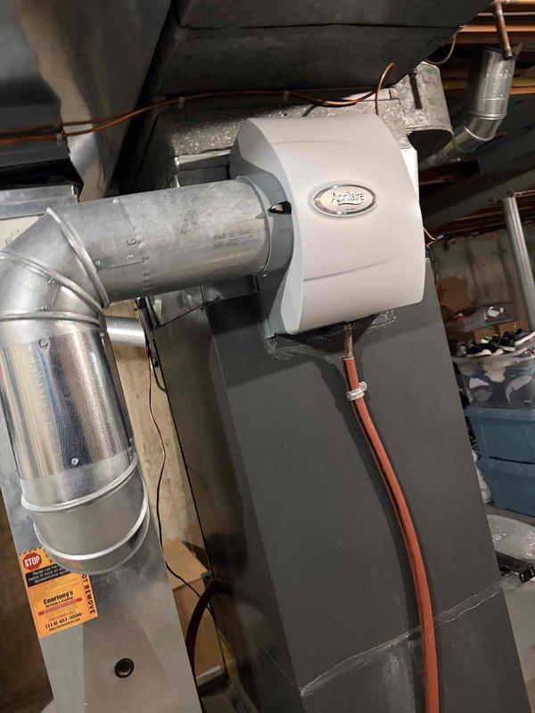 Completed comprehensive heating maintenance tune-up on 15-year-old furnace system. Performed full system inspection including burner assembly, heat exchanger, blower motor, and all safety controls; verified proper operation of humidifier unit and associated ductwork; checked refrigerant lines and electrical connections. System tested and confirmed operating within manufacturer specifications with no deficiencies noted.