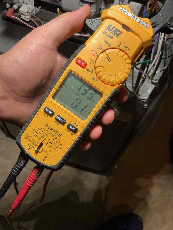 Performed preventative maintenance tune-up on one-year-old Lennox furnace with warranty expiring March 2028. Conducted comprehensive system inspection including electrical diagnostics with multimeter, verified voltage readings at 132V, and documented normal operational parameters. Observed dust accumulation on interior components and base pan during inspection; unit operating within normal specifications with no deficiencies noted.