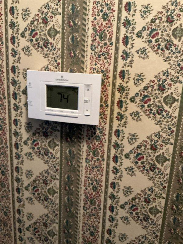Completed annual heating maintenance on a 9-year-old furnace system. Replaced dirty air filter with new PFCC filter, inspected thermostat operation showing 74°F, and verified all system components functioning properly with no additional accessories requiring service.