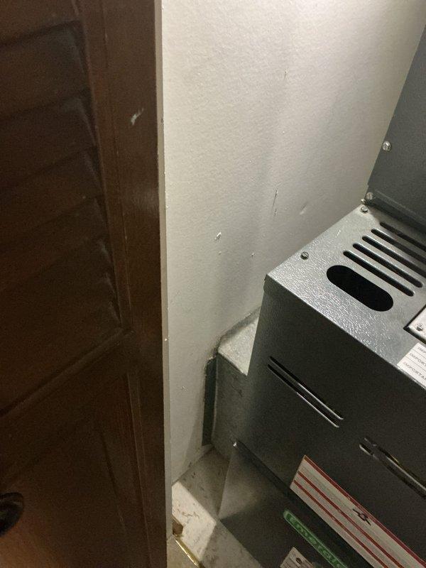 Responded to service call for intermittent banging and knocking noises in walls and vibration under floor, occurring primarily at night in bedroom area over past three years. Inspected 16-year-old furnace unit in utility closet and examined accessible ductwork and refrigerant line set routing throughout home. Evaluated potential thermal expansion/contraction points where metal ductwork and copper line set may contact wood framing or pass through wall cavities, checking for inadequate clearances or missing isolation materials. Documented equipment condition and installation with photos for reference. Advised customer that noises are consistent with normal thermal expansion of ductwork and refrigerant lines as system cycles, particularly noticeable during overnight temperature fluctuations when ambient noise levels are lower.