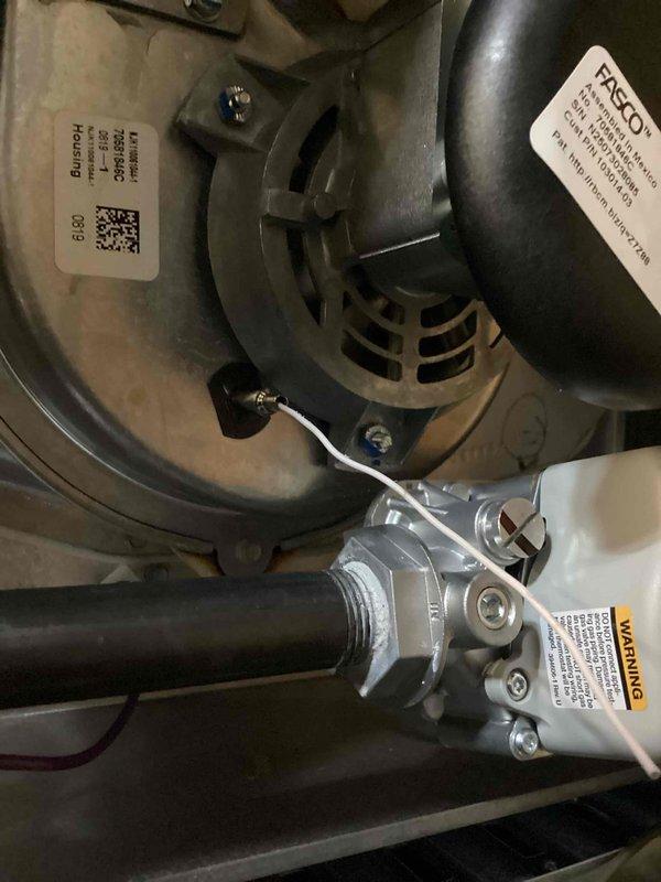 Completed comprehensive Supertune service on basement HVAC system unit U10 with ground-level condenser. Performed full system inspection of blower motor assembly, verified proper operation of all mechanical components, and checked gas valve actuator connections. Inspected Honeywell programmable thermostat displaying proper system operation in cooling mode with indoor temperature at 69°F and outdoor conditions at 62°F. Confirmed all safety labels present and legible, verified blower housing ventilation and airflow, and ensured all electrical connections secure. System operating within normal parameters with no deficiencies noted.