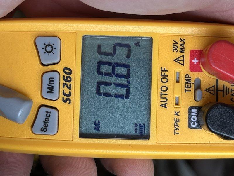 Completed cooling system tune-up on residential AC unit located at side of home. Performed standard maintenance inspection, checked refrigerant levels registering 13.5 degrees superheat, and evaluated overall system operation. Unit exterior shows weathering and discoloration but all mechanical components functioning properly.