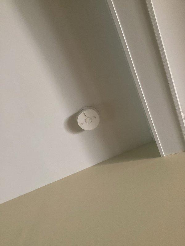 Installed six customer-supplied smoke detectors throughout the residence, mounting units to ceiling surfaces and ensuring proper power connections with operational LED indicators confirmed on all devices. All detectors were tested and verified functioning correctly upon completion of installation.