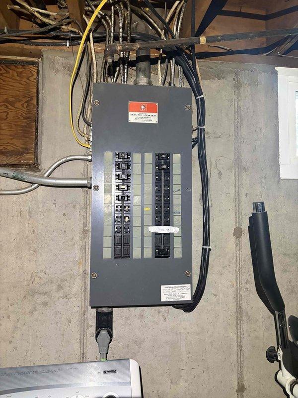 Responded to service call for non-operational upstairs HVAC system installed in July. Upon arrival, inspected 1970s-era fuse panel that had previously failed approximately one month ago requiring fuse replacement. Conducted comprehensive assessment of electrical panel condition, connections, and capacity to support newly installed heating and cooling equipment. Examined all circuit breakers, fuses, and wire terminations for signs of deterioration, overheating, or inadequate amperage rating. Photographed existing panel configuration showing aged wiring, multiple circuit connections, and overall panel condition. Inspected HVAC equipment electrical connections including capacitor, control wiring, and power supply terminations to verify proper installation and identify any contributing factors to system failure. Evaluated whether existing electrical infrastructure meets current code requirements and has sufficient capacity to reliably operate new HVAC system without repeated outages. Based