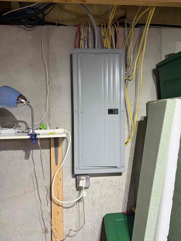 Responded to service call for flickering kitchen light fixture. Conducted comprehensive electrical home audit, inspecting main electrical panel, service meter, and associated wiring systems. Documented electrical infrastructure including panel box with multi-conductor wiring, exterior meter installation with proper conduit routing, and ground wire connections. All critical electrical components photographed for service records.