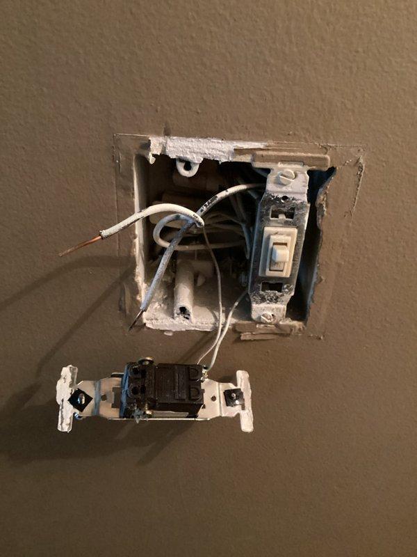 Responded to service call for non-functioning ceiling fan and electrical issues including flickering lights and hot outlets in multiple rooms. Performed comprehensive electrical inspection and troubleshooting of affected circuits in bedroom, dining room, and kitchen areas. Identified and addressed defective switch mechanisms and compromised wiring connections at multiple locations, removed faulty devices from electrical boxes, and documented existing conditions showing deteriorated wire terminations and improper installations contributing to intermittent power issues and overheating concerns.