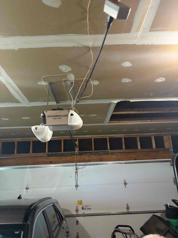Responded to customer report of flickering and dimming lights occurring when high-draw appliances such as microwave, air fryer, air conditioning unit, and washing machine were in operation. Performed comprehensive electrical system inspection including visual examination of main service panel, metering equipment, and garage electrical components. Assessed voltage stability and circuit loading conditions to identify potential causes of power fluctuations affecting lighting circuits throughout the residence.
