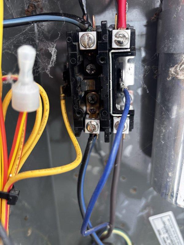 Responded to no cooling call on residential unit located in side yard. Found failed contactor preventing system from energizing. Contactor showed signs of pitting and corrosion on contact points, causing open circuit condition. Removed defective contactor, installed new replacement unit, and verified proper electrical connections. Tested system operation and confirmed cooling cycle initiated properly with compressor and condenser fan running as designed.