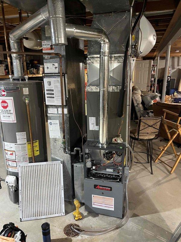 Completed preventive maintenance tune-up on single furnace unit located in basement mechanical room. Performed comprehensive system inspection including visual assessment of ductwork connections, electrical components, and gas piping. Replaced standard pleated air filter which showed moderate dust accumulation, installed new filter to ensure proper airflow and system efficiency. Verified all safety controls, tested blower operation, and confirmed proper venting. System operating within manufacturer specifications with no issues identified at time of service.
