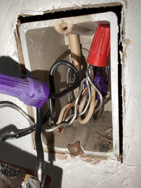 Completed electrical service call involving estimate and troubleshooting work for installation of 10 new circuit breakers in the electrical panel. Assessed existing junction box wiring configurations, documented multiple wire connections secured with appropriate wire nuts, and verified proper wire bundling and grounding connections within wall-mounted electrical boxes.