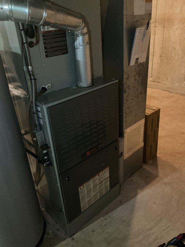 Completed annual heating maintenance tune-up on 8-year-old Trane furnace system with integrated Aprilaire humidifier. Performed comprehensive inspection of all furnace components, verified proper operation of heating system, checked ductwork connections, and confirmed humidifier functionality. System operating within manufacturer specifications with no deficiencies noted.