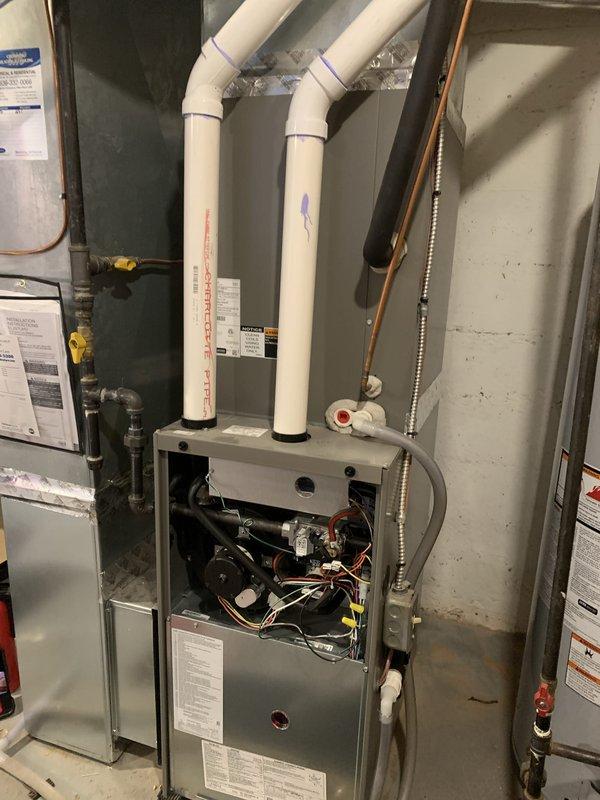 Completed comprehensive heating tune-up maintenance on two furnace units located in basement utility closet and second floor. Performed standard seasonal maintenance procedures including inspection of burner assembly, heat exchanger, blower motor, electrical connections, and gas valve operation on both systems. Verified proper thermostat operation and system cycling, confirmed venting integrity on PVC exhaust and intake piping, and ensured all safety controls functioning within manufacturer specifications. Both units operating efficiently with no deficiencies noted at time of service.