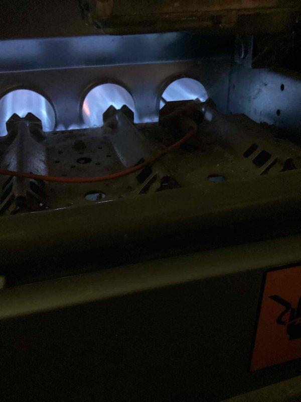 Completed comprehensive heating tune-up and safety inspection on 25-year-old gas furnace unit. Performed full system evaluation including blower motor assembly, heat exchanger inspection through visual examination of combustion chamber and burner components, verified gas valve operation, checked all electrical connections and wiring throughout the unit, and confirmed proper airflow through the system. All components found operational with unit returning to normal heating service.