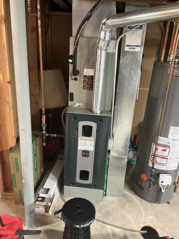 Completed comprehensive seasonal tune-up on 4-year-old Trane furnace and 5-year-old air conditioning system. Performed full system inspection, cleaned and checked all components on both units, verified proper operation of thermostat and controls, inspected ductwork and connections, and confirmed both systems operating within manufacturer specifications with no issues found.