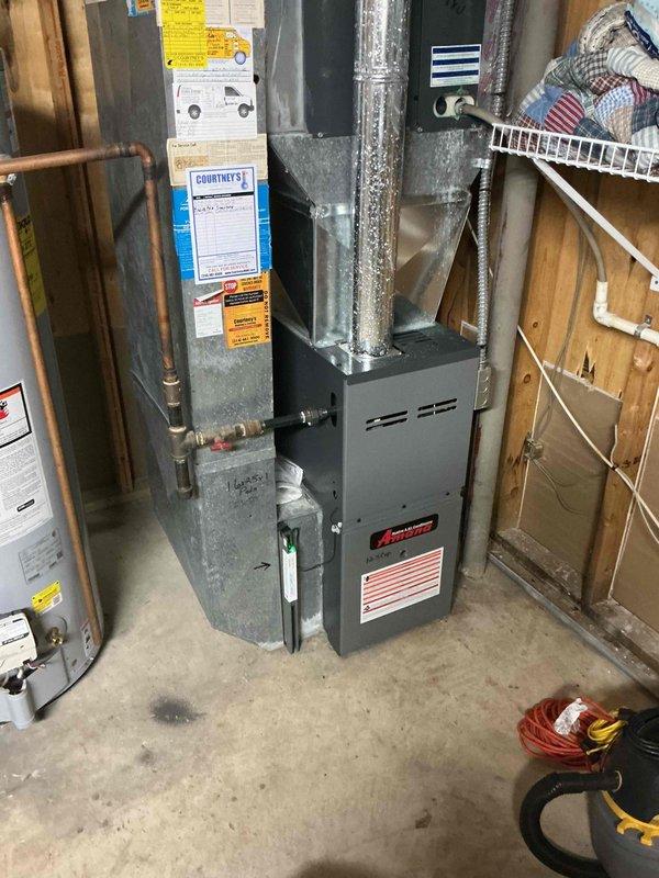 Completed scheduled heating tune-up on Amana furnace unit located in basement utility area. Performed comprehensive system inspection, cleaned and tested all components, verified thermostat operation showing 77°F, and confirmed proper airflow through ductwork. All equipment operating within manufacturer specifications with no issues identified.