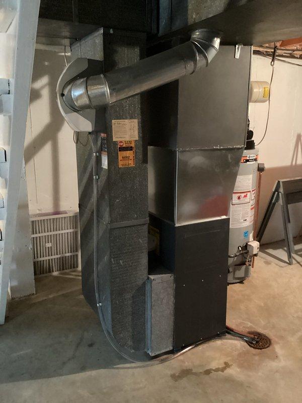 Completed installation of 600 CFM humidifier on existing HVAC system. Unit was properly mounted, water supply line connected with shutoff valve and insulated piping, and integrated with ductwork. System tested and confirmed operational.