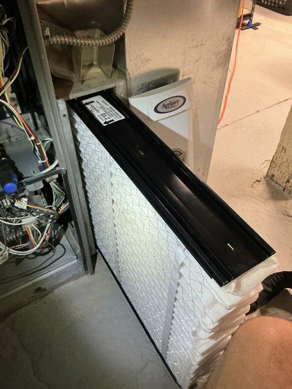 Completed heating tune-up and preventative maintenance on Lennox furnace unit located in basement mechanical room. Performed standard inspection procedures, checked all electrical connections and control components, and installed clean air filter in system. All equipment found operating within normal parameters with no immediate service concerns identified.