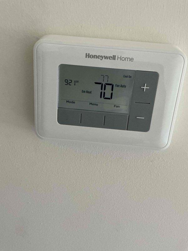Completed comprehensive Supertune maintenance on Lennox HVAC system for new homeowner. Performed thorough inspection and cleaning of both air conditioning and furnace components, verified thermostat operation showing emergency heat mode active with system calling for cooling. All equipment operational following tune-up procedures with no immediate service concerns identified.