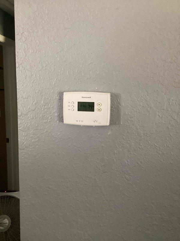 Responded to no cooling call on 15-year-old residential air conditioning system. Performed comprehensive diagnostic evaluation of outdoor condensing unit and indoor air handler components. Inspected thermostat operation, verified system controls, and assessed ductwork condition. Documented system configuration and current operating conditions with photographic evidence for service records.