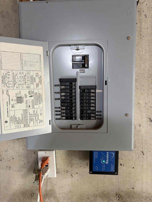 Completed electrical service upgrade including installation of surge protector at main electrical panel and additional outlet installation in garage area. Successfully sold and enrolled customer in autopay membership program for ongoing service coverage.