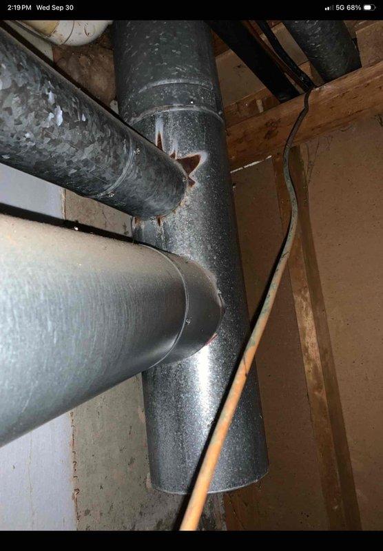 Completed pre-sale mechanical inspection and addressed multiple safety and maintenance concerns. Replaced deteriorated exhaust venting at first floor furnace and common vent tee for flue system. Located and repaired gas leaks in fuel runs, then marked all gas lines with yellow identification to differentiate from copper water lines per code requirements. Cleaned second floor AC unit condenser coil to restore proper airflow and system efficiency.