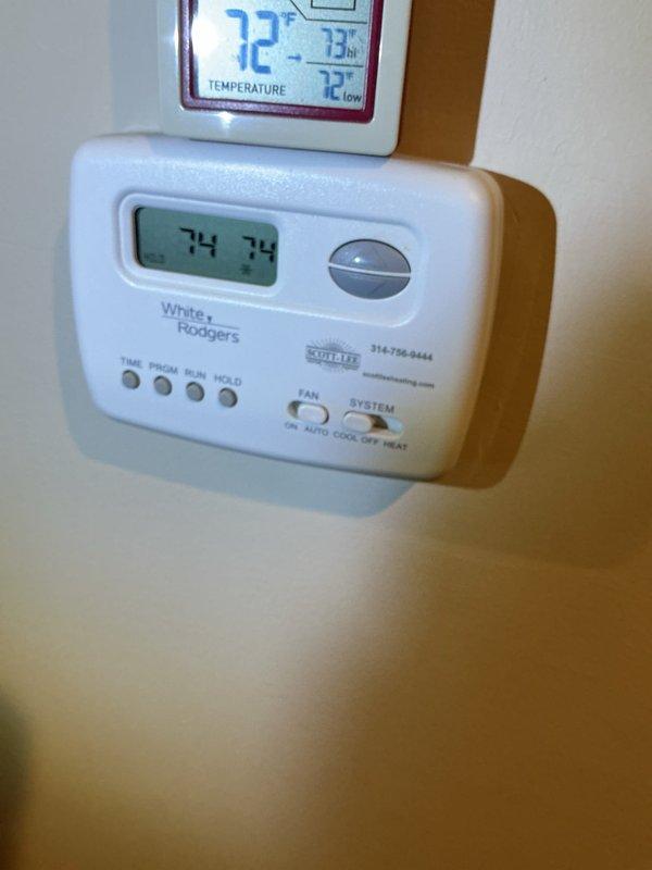 Completed comprehensive U10 Supertune maintenance on 10-year-old Lennox furnace and air conditioning system located in basement. Performed full system inspection, cleaned and tested all components, verified proper operation of White Rodgers programmable thermostat displaying correctly at 74°F, inspected air handler with clean filter in place, checked electrical connections, tested safety controls, measured temperature differentials, and lubricated moving parts as needed. System operating within manufacturer specifications with no issues identified. Documentation photos captured for service records.