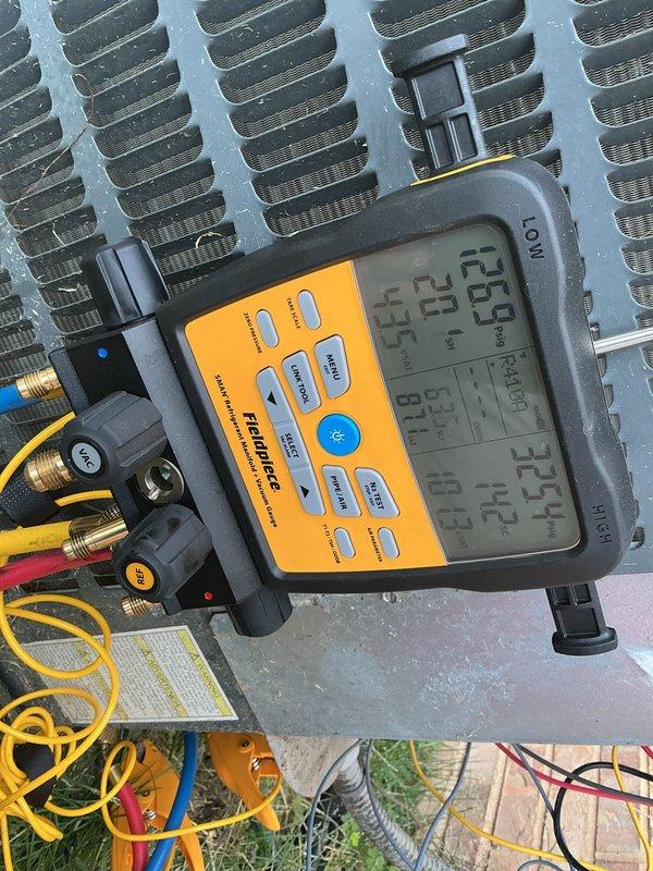 Replaced failed compressor on residential air conditioning system. Removed and disposed of old compressor showing signs of corrosion and deterioration, installed new replacement unit, brazed copper line connections, performed vacuum and leak test, recharged system with refrigerant to manufacturer specifications, and verified proper operation with temperature differential readings confirming system cooling at 35.5°F supply temperature. Unit tested and operational upon departure.