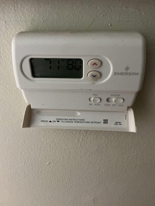 Completed heating system tune-up on single unit located in basement. Performed comprehensive maintenance including filter inspection and replacement, thermostat functionality verification, and system diagnostics. Unit under 10 years old showed normal operating condition with Emerson programmable thermostat responding properly to temperature setpoint adjustments.