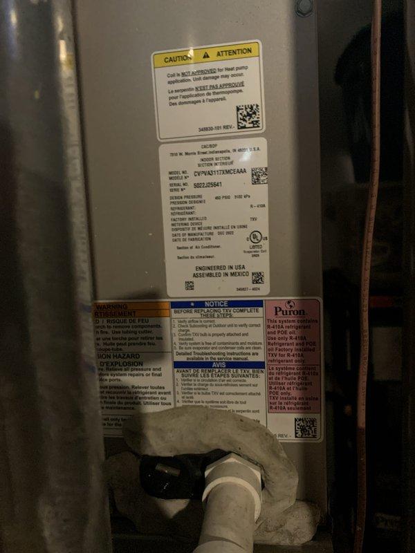 Completed comprehensive tune-up service on a 2-year-old HVAC system consisting of a Puron-based air conditioning unit (Model: DPVA412MCAA) and furnace. Performed full system inspection, replaced heavily soiled 16x25x1 air filter that showed significant dust and debris accumulation, verified refrigerant levels and pressures, inspected all manufacturer labels and safety documentation for compliance, and tested system operation to ensure optimal performance of both heating and cooling components.