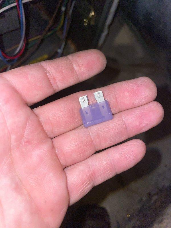 Responded to service call for blank first floor thermostat on 4-year-old residential HVAC system. Upon inspection, diagnosed blown fuse in low-voltage control circuit preventing thermostat operation. Replaced defective fuse with proper amperage automotive-style blade fuse, restoring power to thermostat and normal system function. Verified both heating units operational, tested thermostat display and controls, and confirmed proper communication between thermostat and equipment.