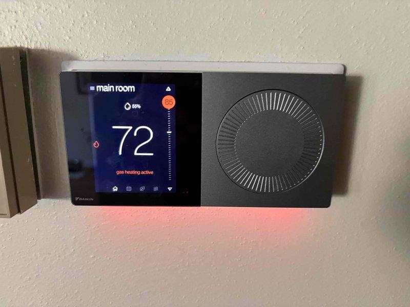Completed comprehensive heating tune-up on 6-year-old basement furnace unit, including full system inspection, combustion analysis, and filter replacement. Investigated customer concern regarding white residue on furnace pipe and documented findings with photos. System tested and verified operational with thermostat displaying proper heating function at 72°F setpoint.