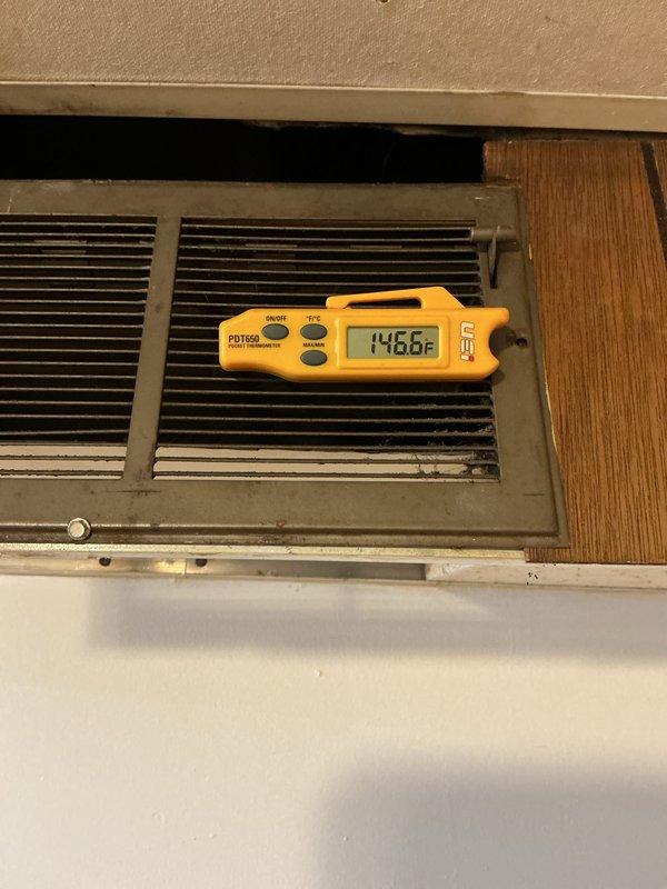 Performed operational verification and tune-up on heating system for vacant residential property in preparation for as-is home sale. Confirmed thermostat functionality with unit responding to heat call, verified proper system operation with supply air temperature measuring 146.6°F at register, and conducted visual inspection of accessible components. System found to be operational with no immediate deficiencies noted during standard tune-up procedures.